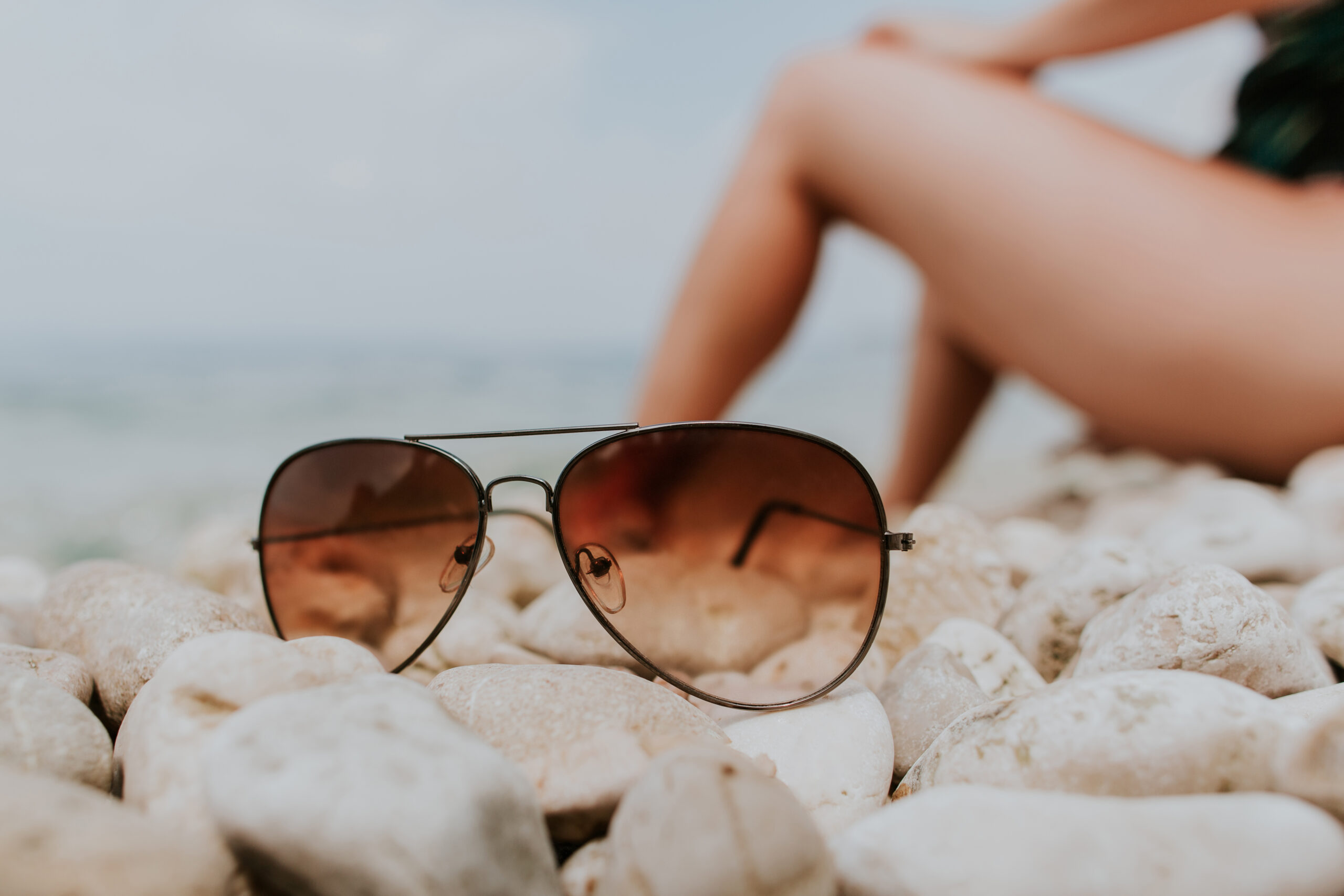 Sunglasses on a rocky beach